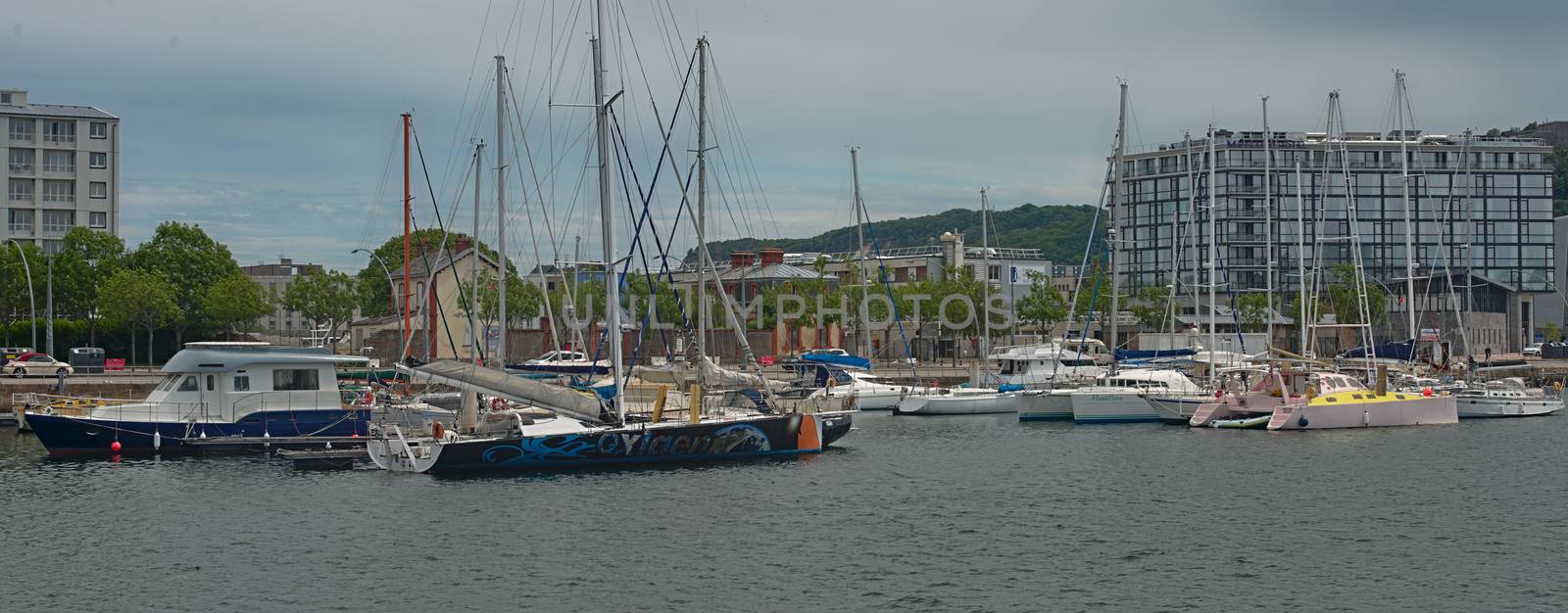 CHERBOURG, FRANCE - June 6th 2019 - Harbor with docked boats by sheriffkule