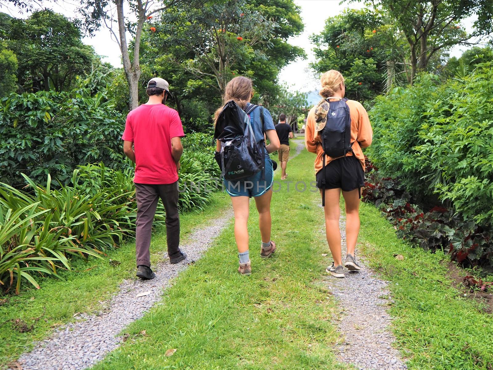 three tourists backpacking round central america