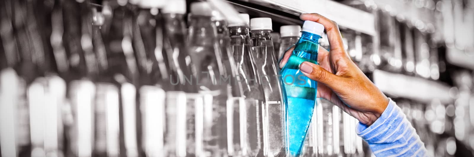 White background with vignette against woman picking a bottle of water