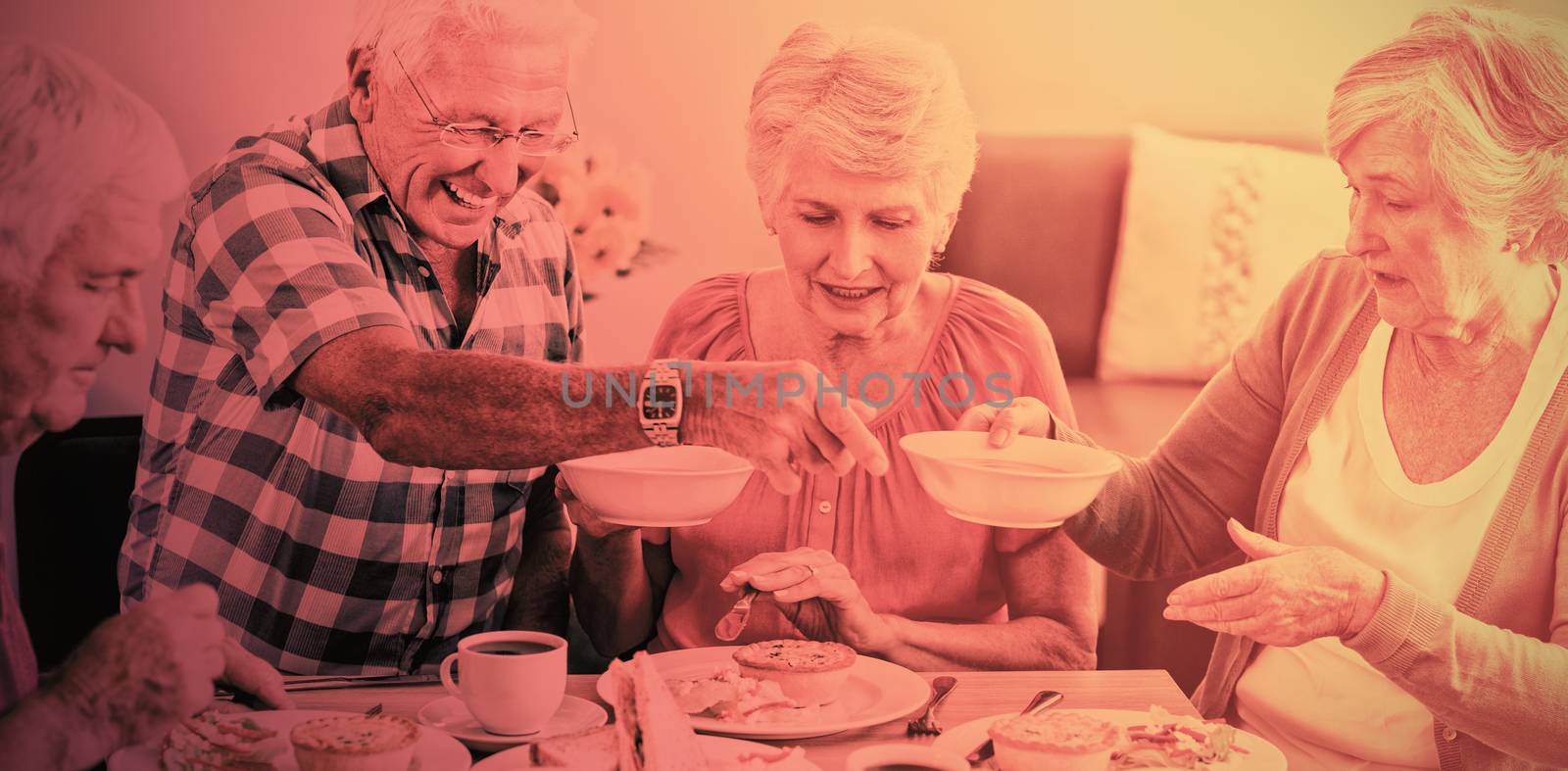 Seniors having lunch together by Wavebreakmedia