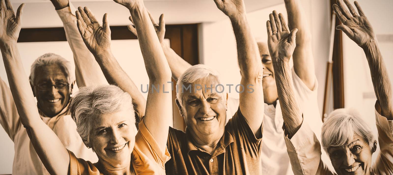 Seniors doing exercises in a retirement home