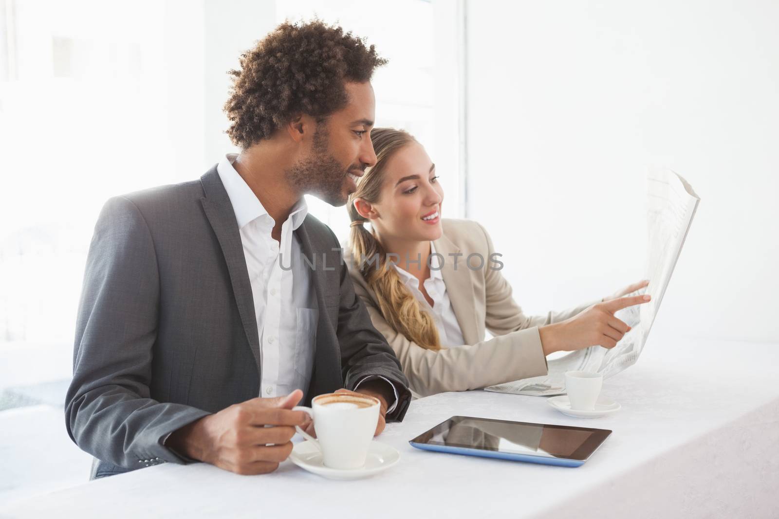 Business people having coffee on their break by Wavebreakmedia