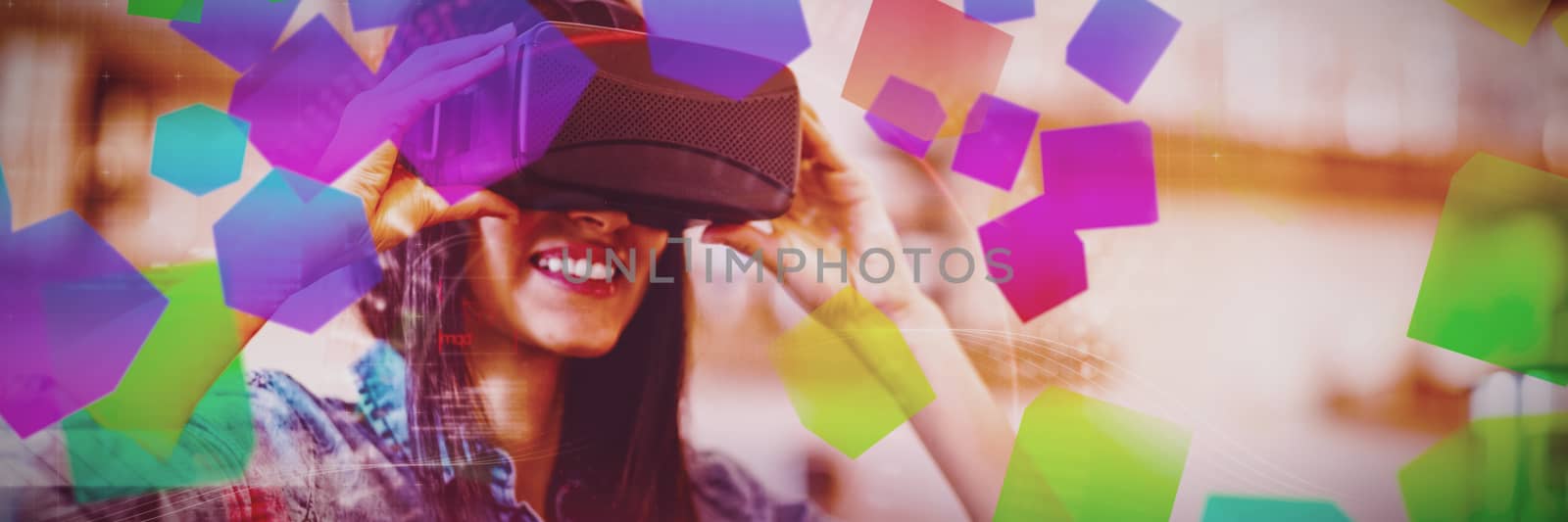 Young woman using the virtual reality headset at office cafeteria