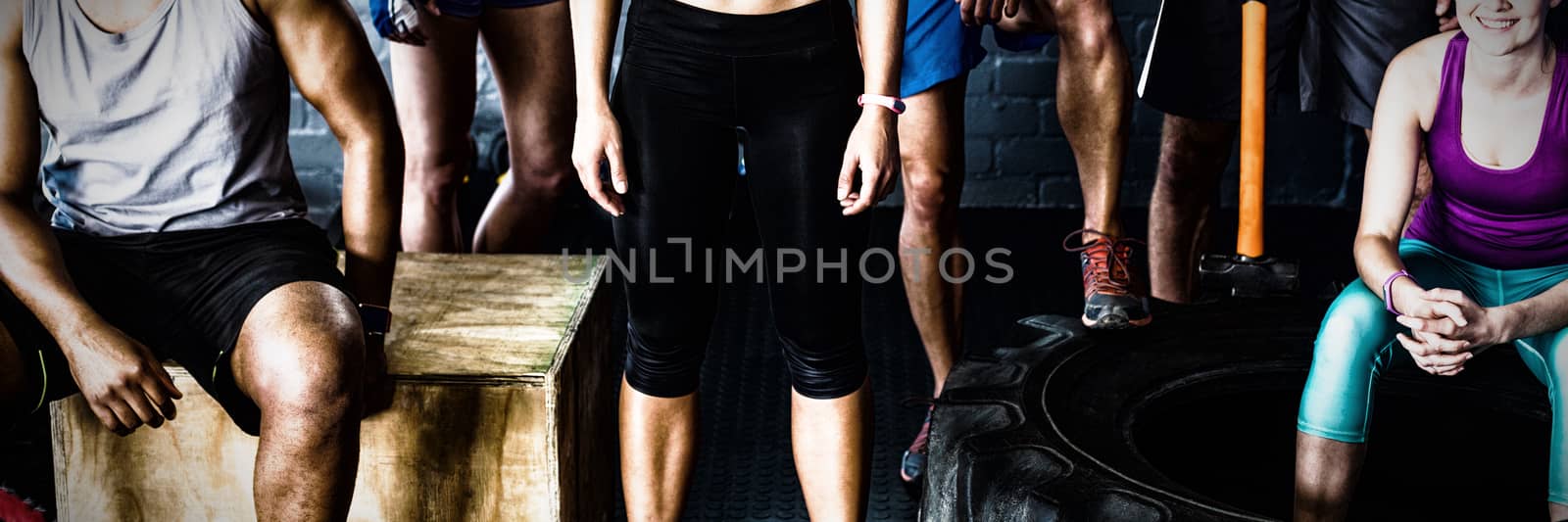 Portrait of happy athlete friends in gym