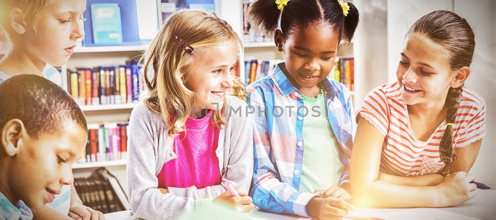 Kids interacting with each other in library at school