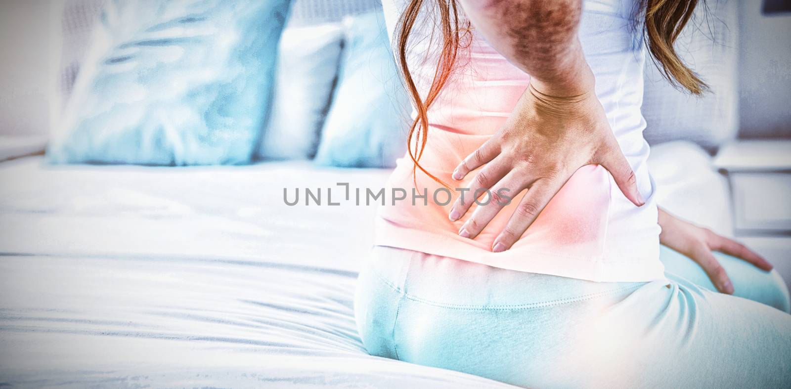 Digital composite of highlighted spine of woman with back pain at home