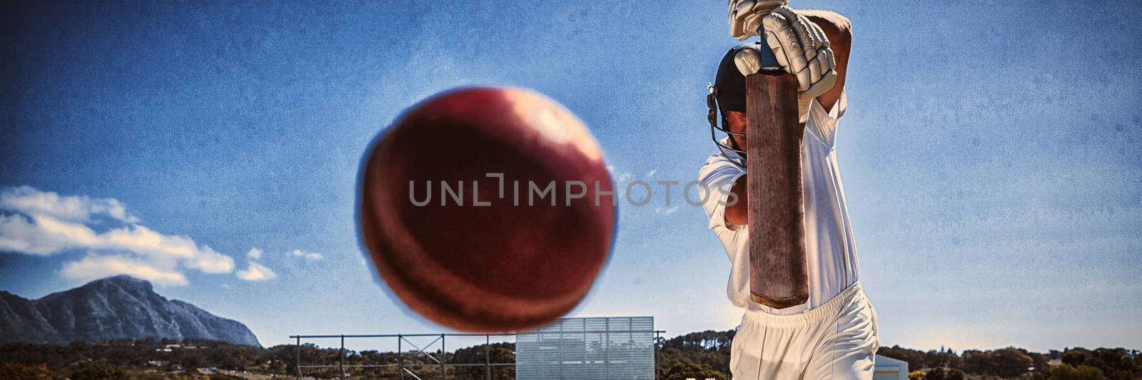 Full length of batsman playing cricket on pitch against blue sky by Wavebreakmedia