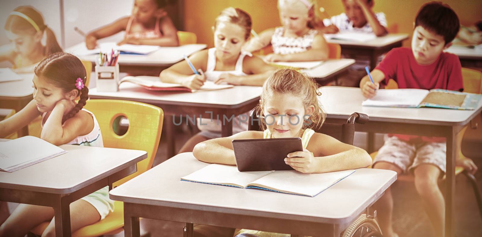 School kids studying in classroom at school