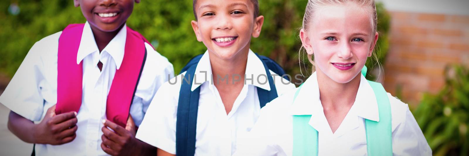 School kids standing in school terrace by Wavebreakmedia