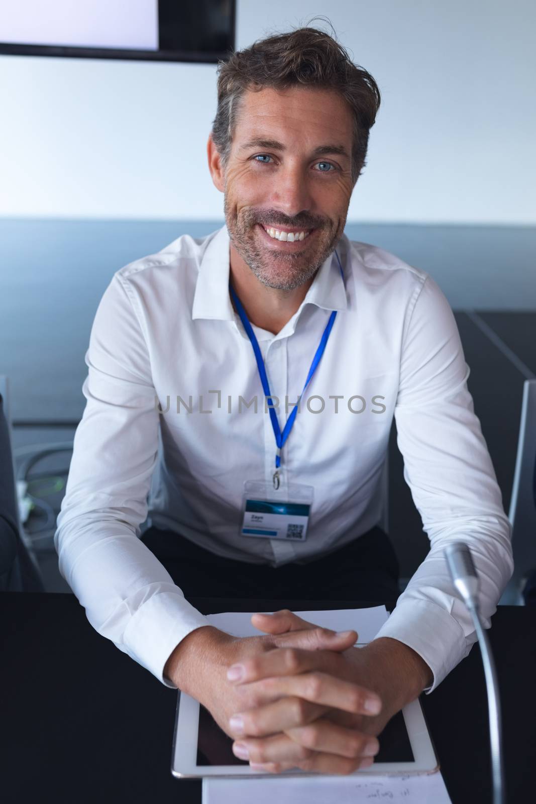 Close-up of caucasian businessman looking at camera in a business conference. International diverse corporate business partnership concept