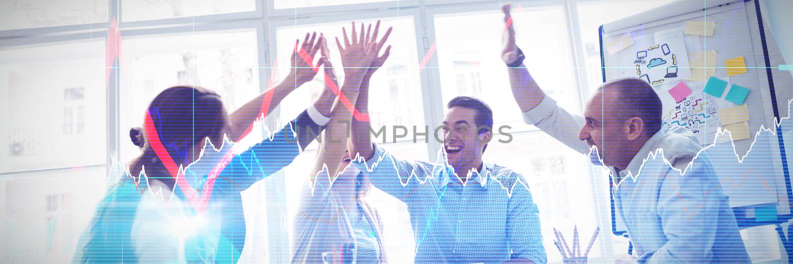 Stocks and shares against photo editors high-five in meeting room