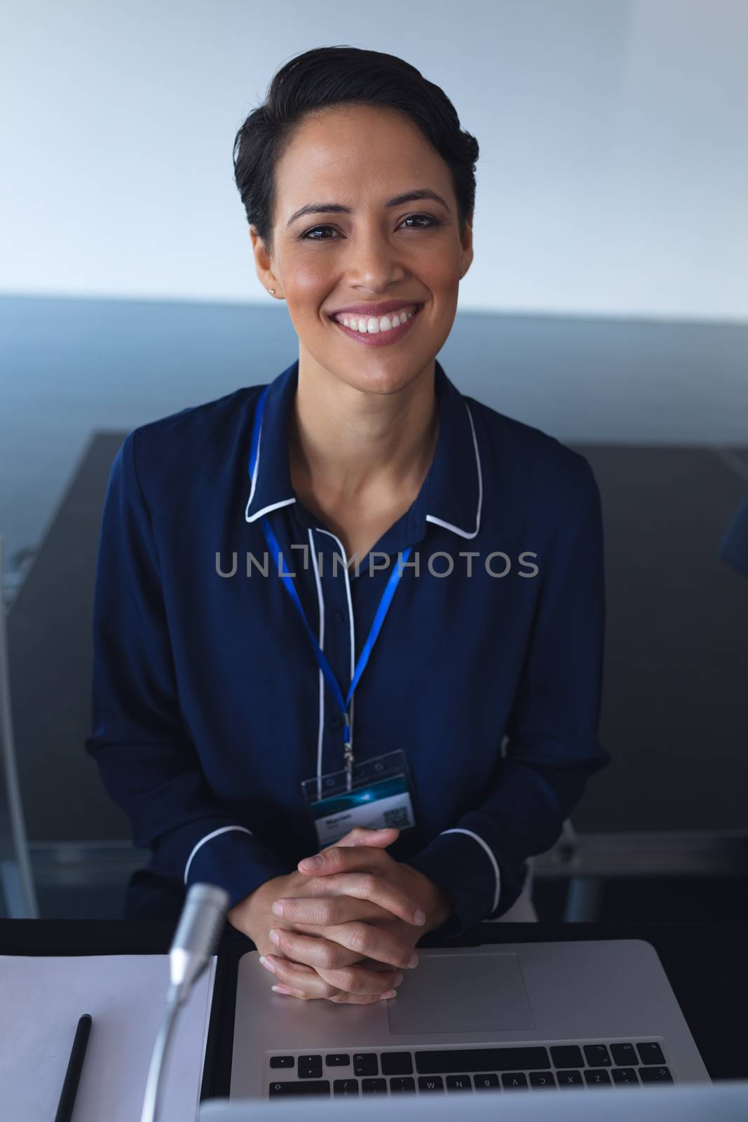 Close-up of caucasian businesswoman looking at camera in a business conference. International diverse corporate business partnership concept