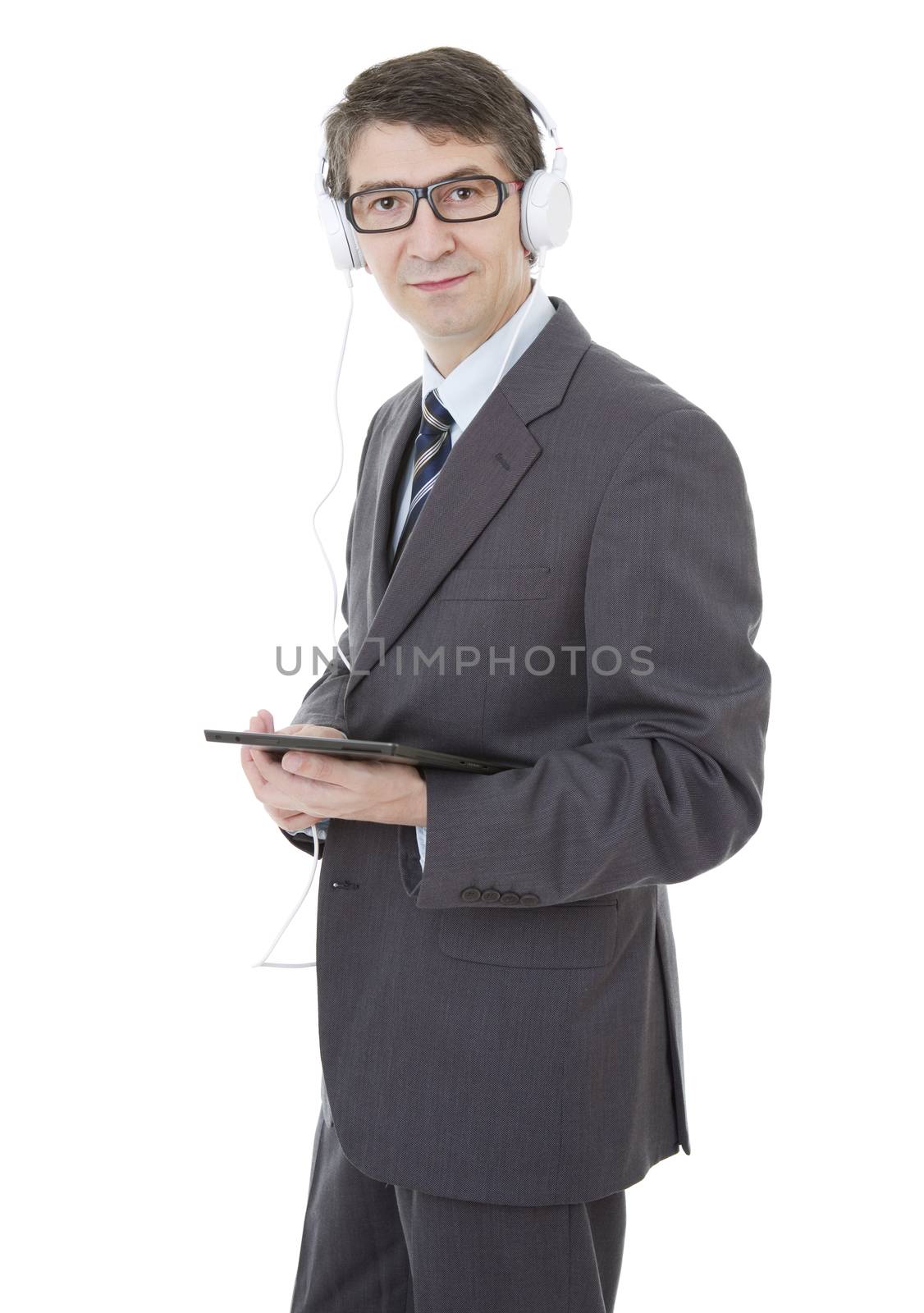 businessman working with tablet pc and headphones, isolated