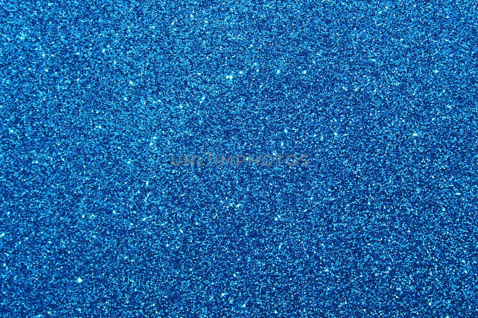 The picture shows a background with blue glittery paper