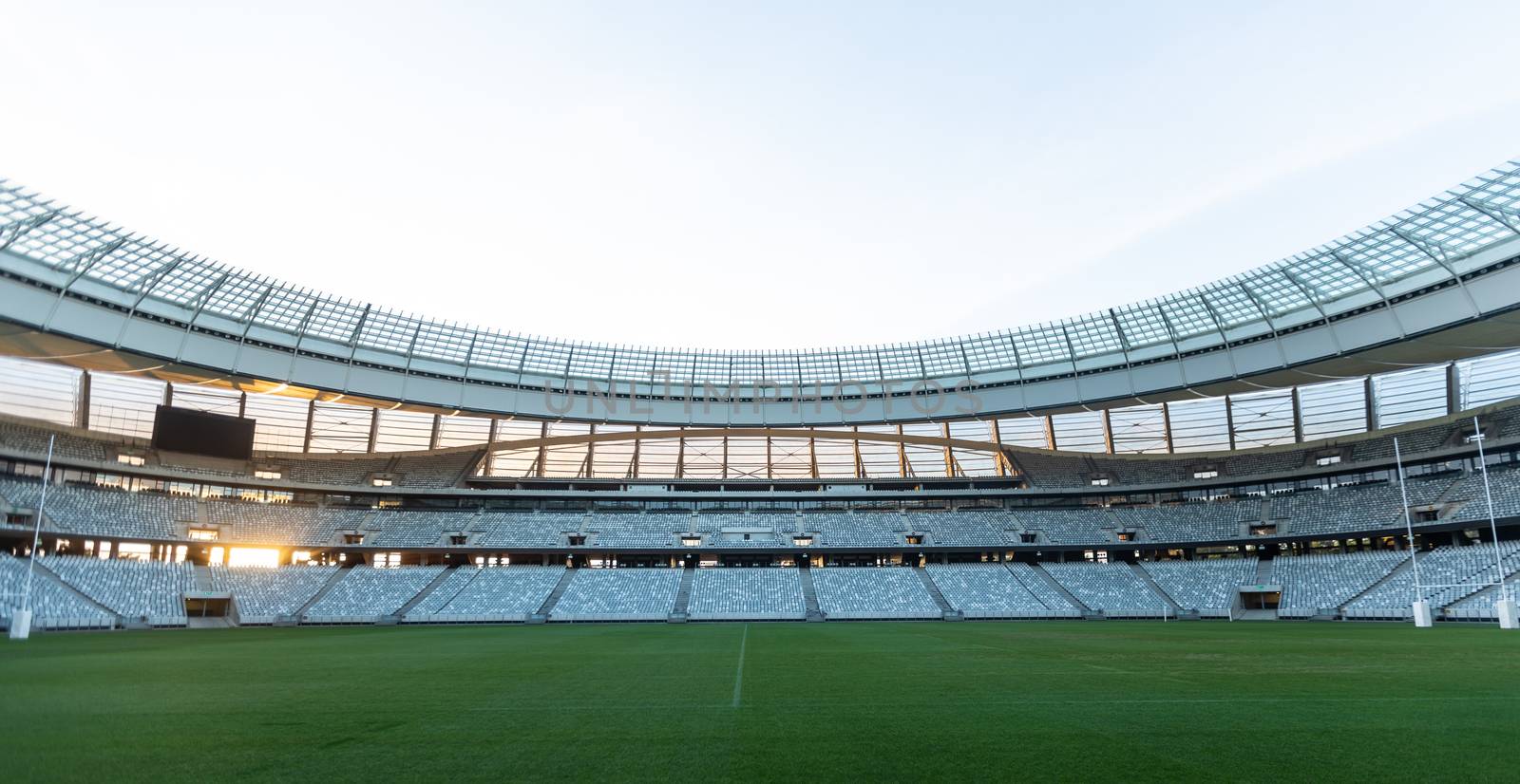 Front view of empty Rugby stadium at dawn