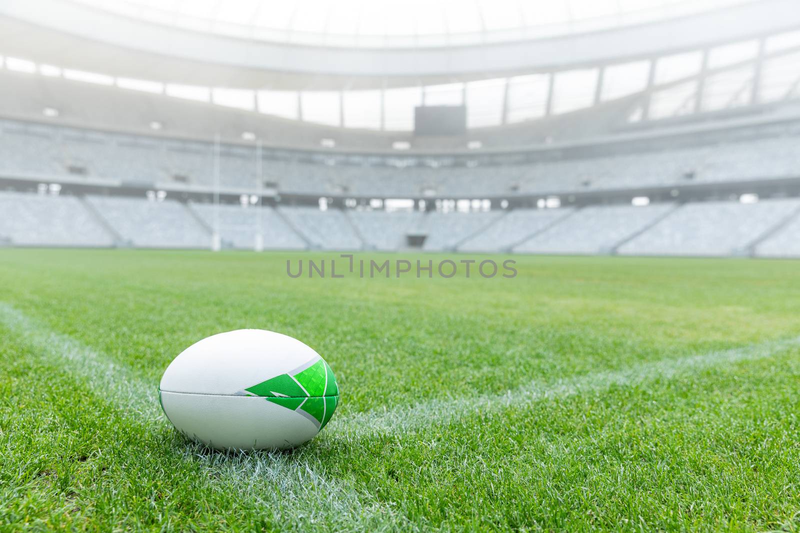 Close-up of Rugby ball on a grass in the empty stadium