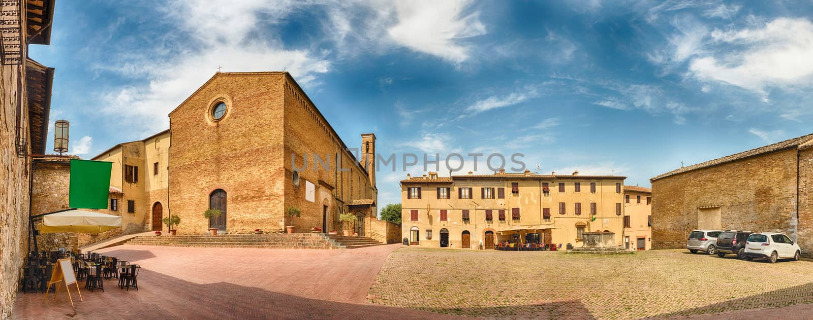 Panoramic view with the Church of Sant'Agostino, landmark in the medieval town of San Gimignano, Tuscany, Italy