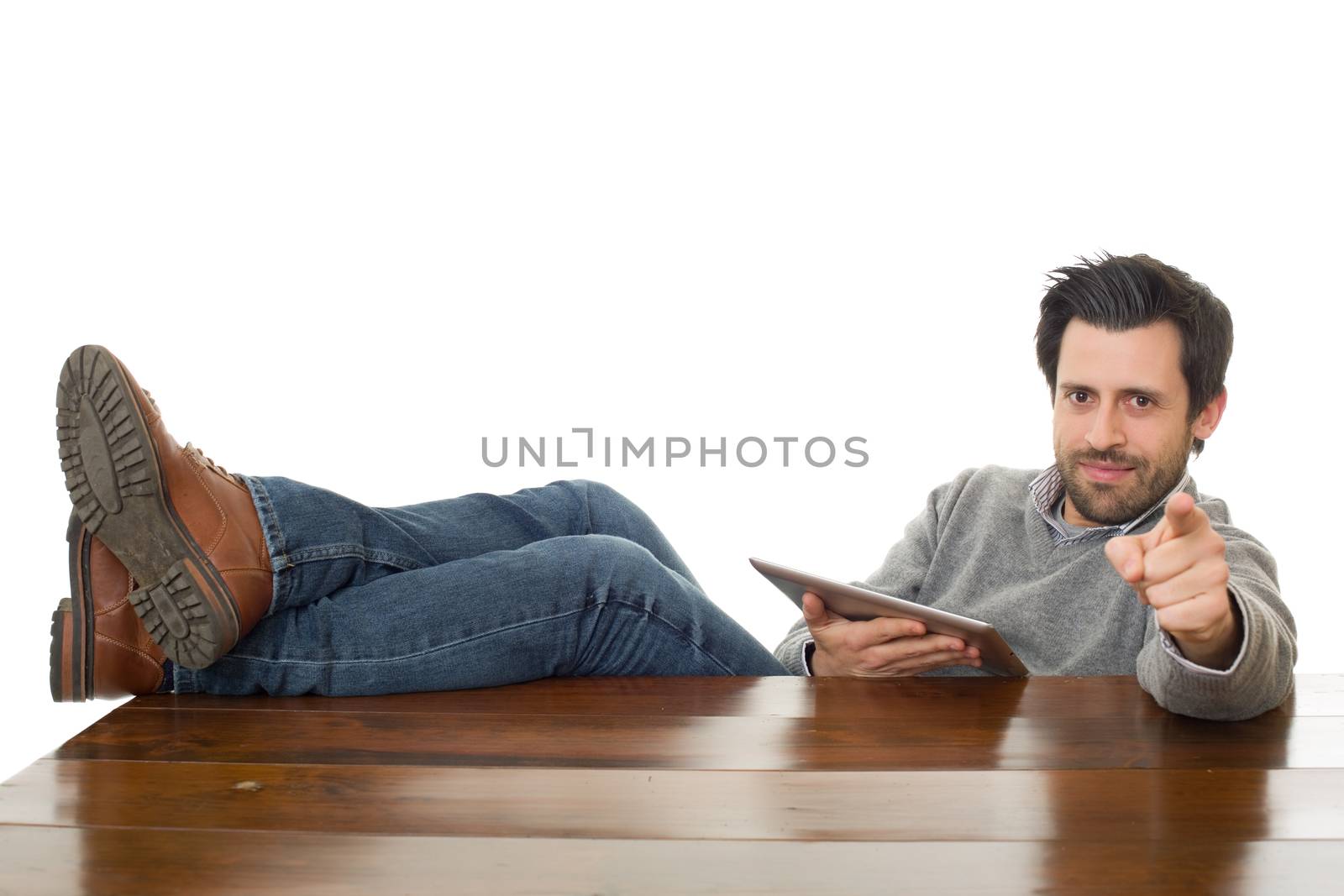happy man on a desk with a tablet pc, isolated