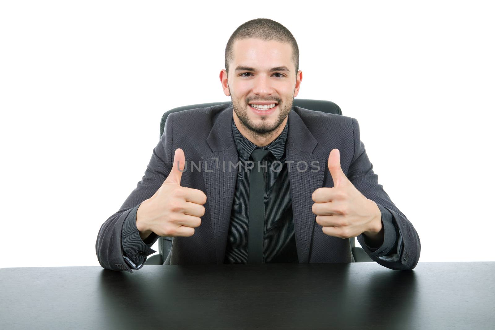 happy business man on a desk, isolated on white