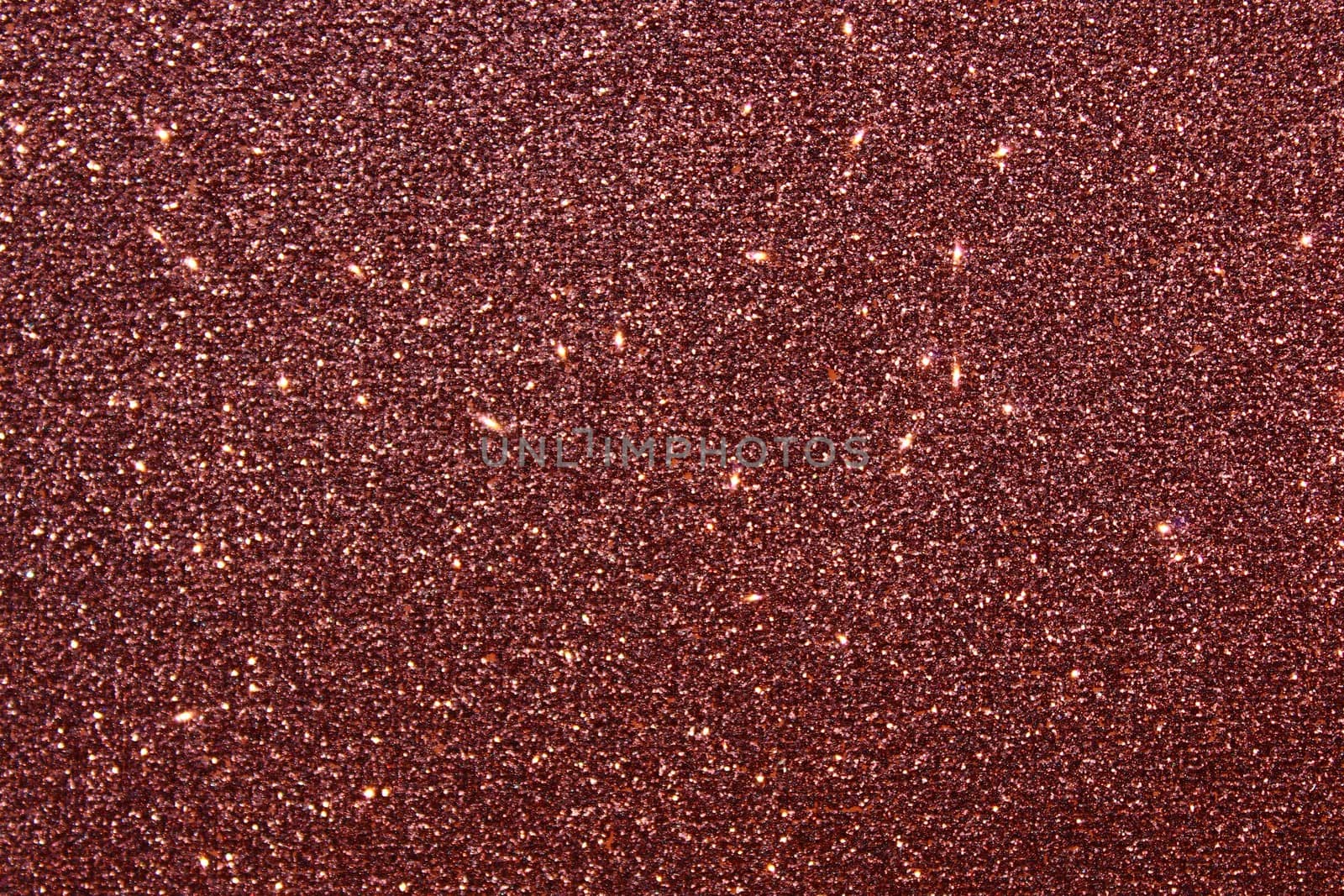 The picture shows a background with red glittery paper