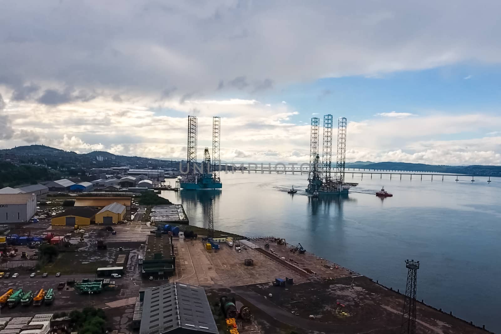 Drilling platform in the port. Towing of the oil platform.