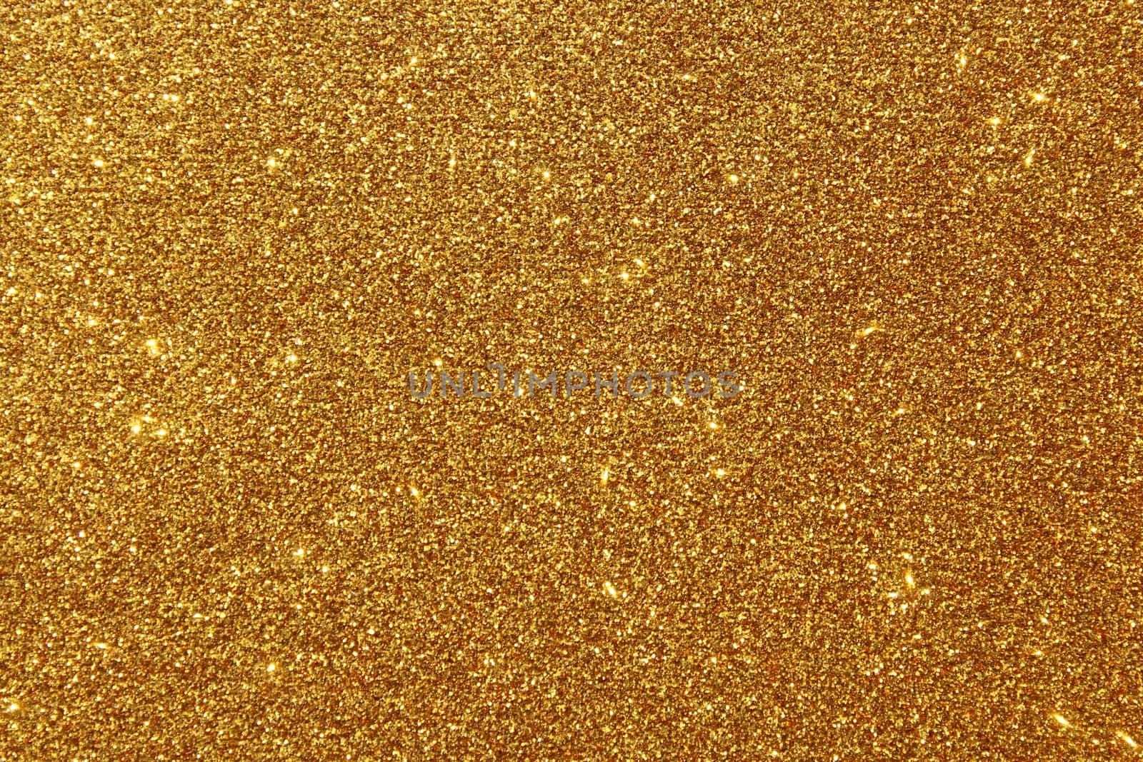 The picture shows a background with golden glittery paper