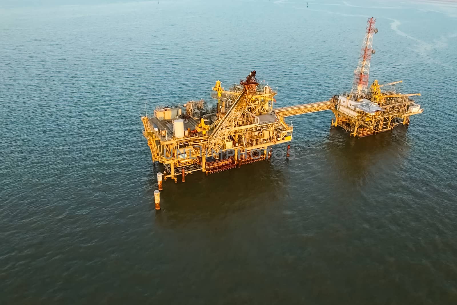 Drilling platform in the port. Towing of the oil platform.