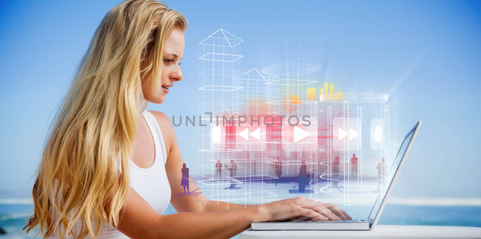 Composite image of pretty blonde using her laptop at the beach by Wavebreakmedia