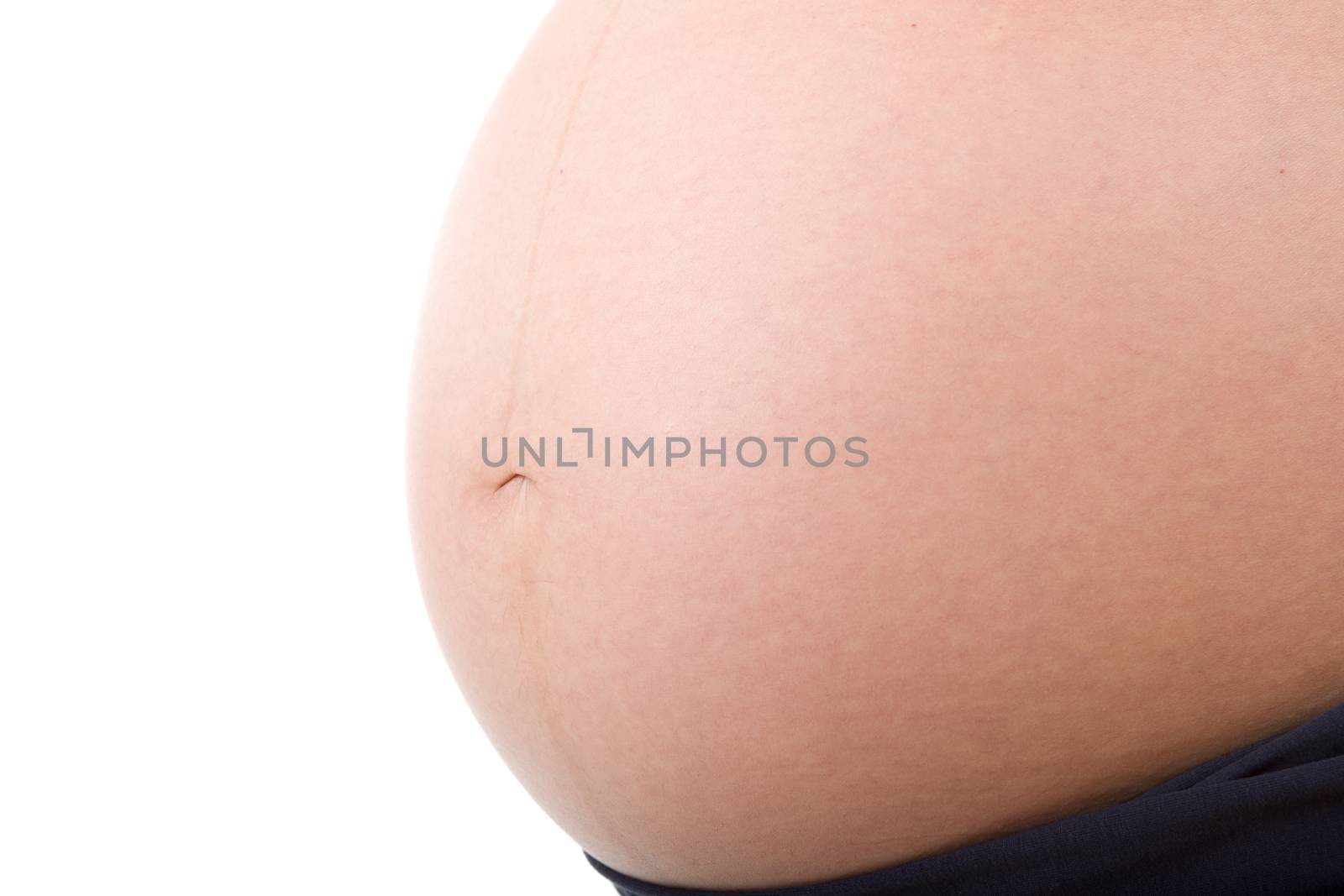 Closeup of pregnant woman at white background