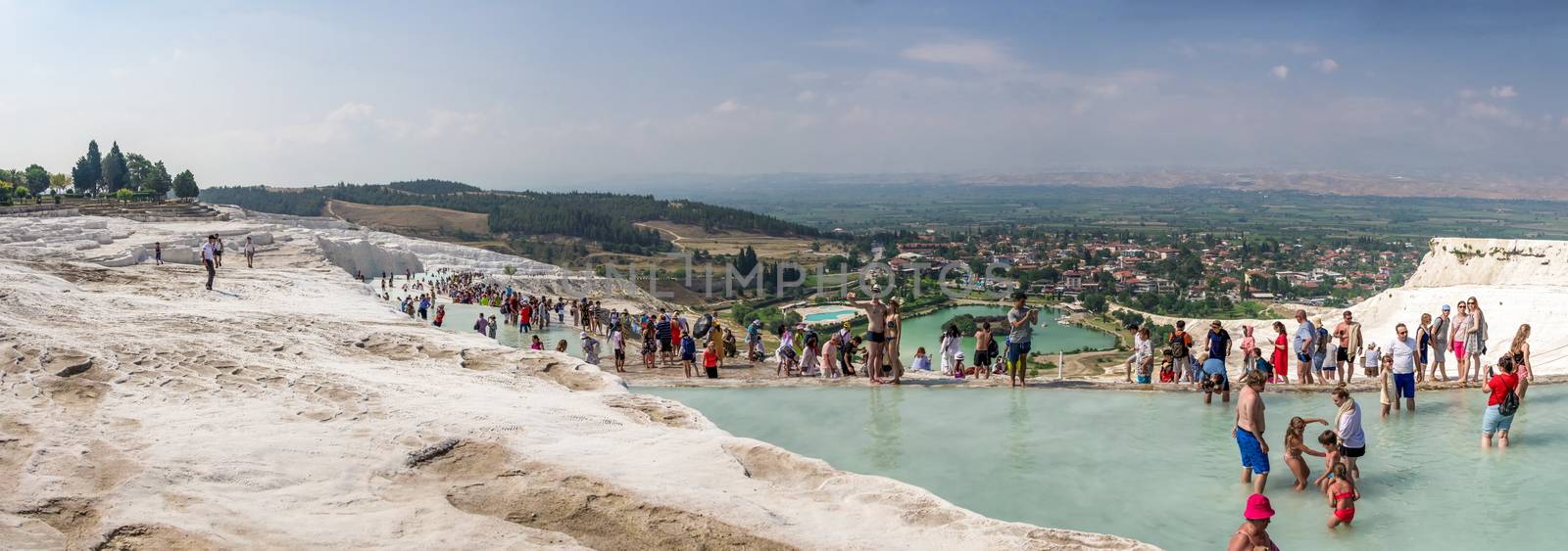 Pamukkale, Turkey – 07.15.2019. White limestone mineral fields in Pamukkale, Turkey, on a sunny summer day.