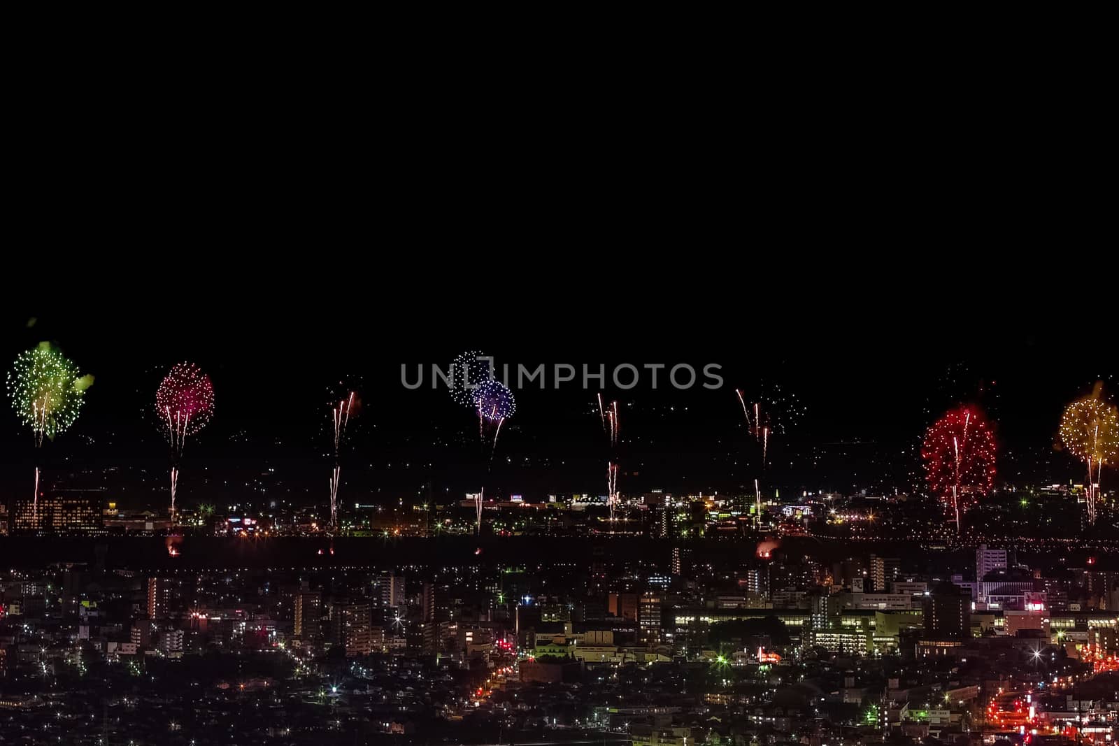 Salute over the city the megalopolis. Festive salute in the nigh by nyrok