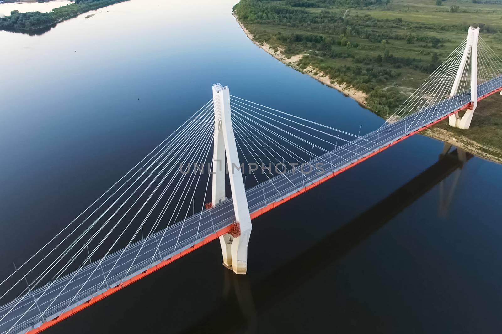 Beautiful bridge over the river. The bridge on the cables is road.