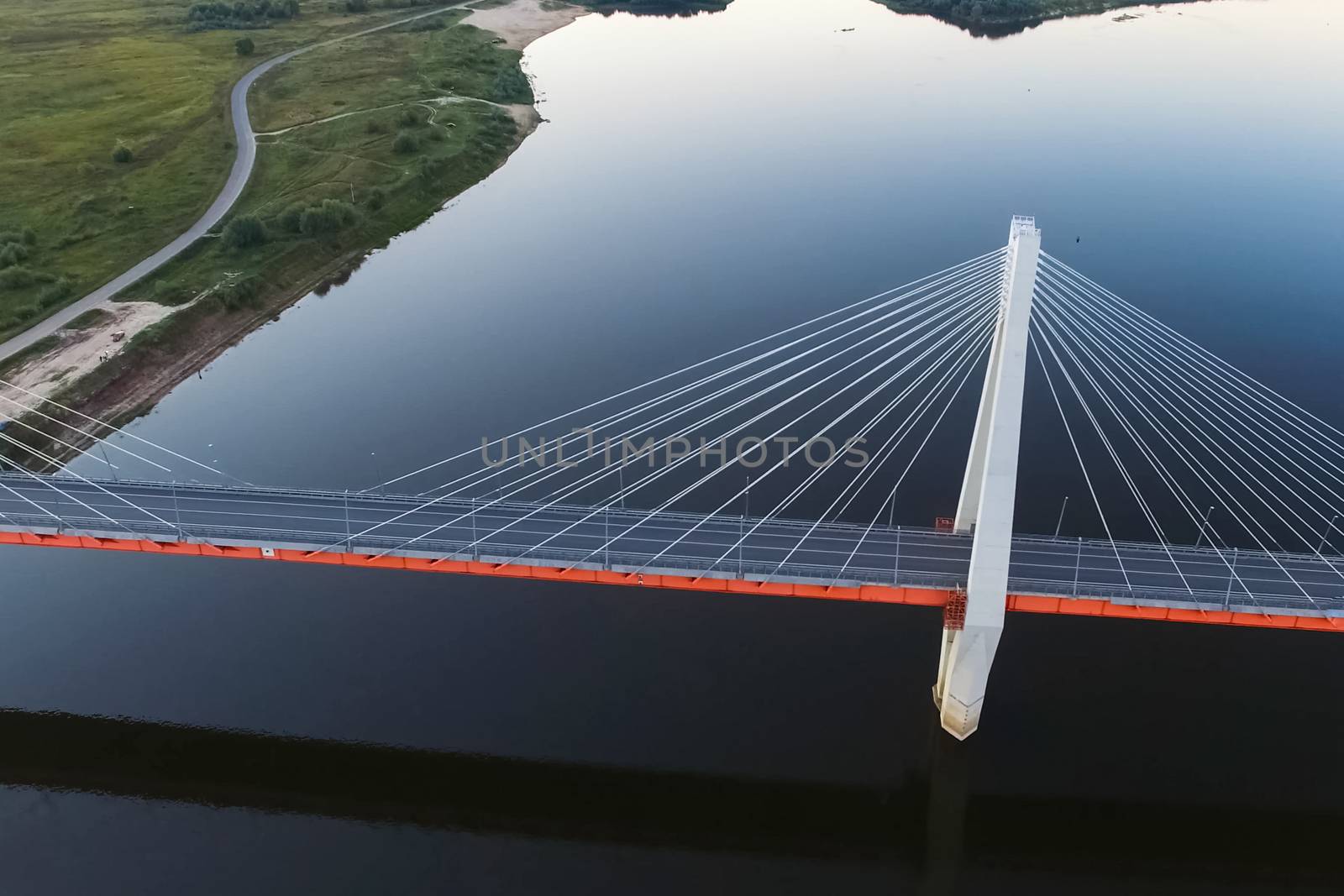 Beautiful bridge over the river. The bridge on the cables is road.