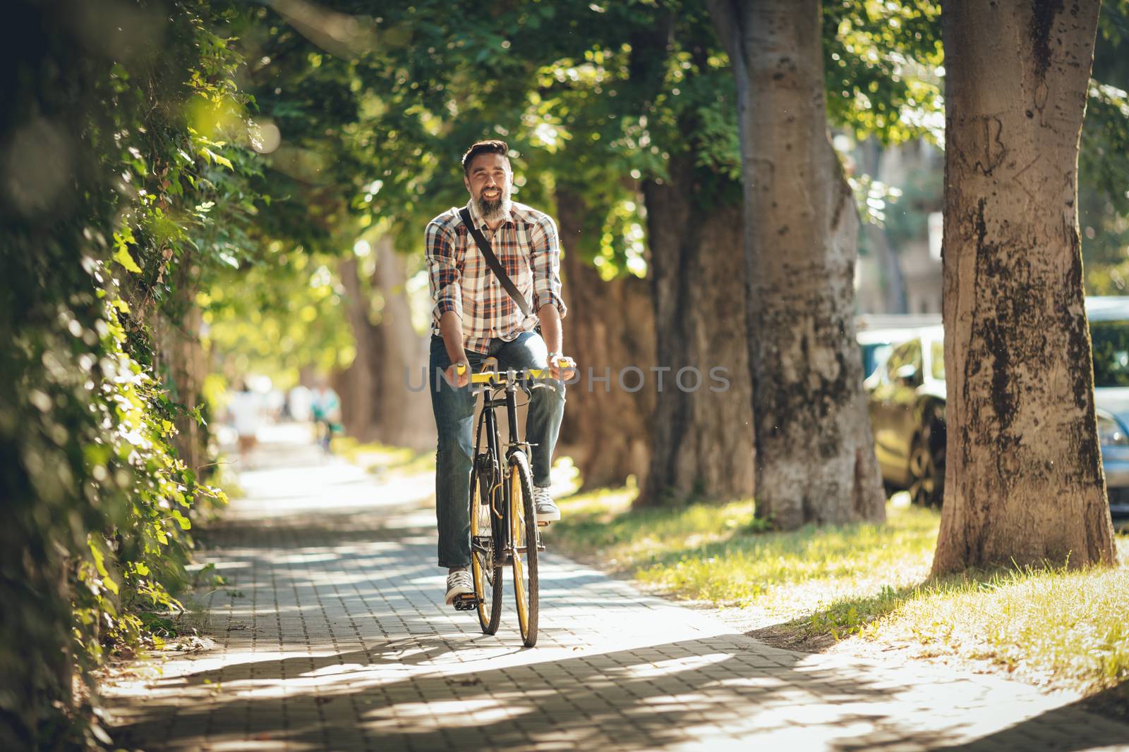 Handsome Man Riding Bicycle by MilanMarkovic78
