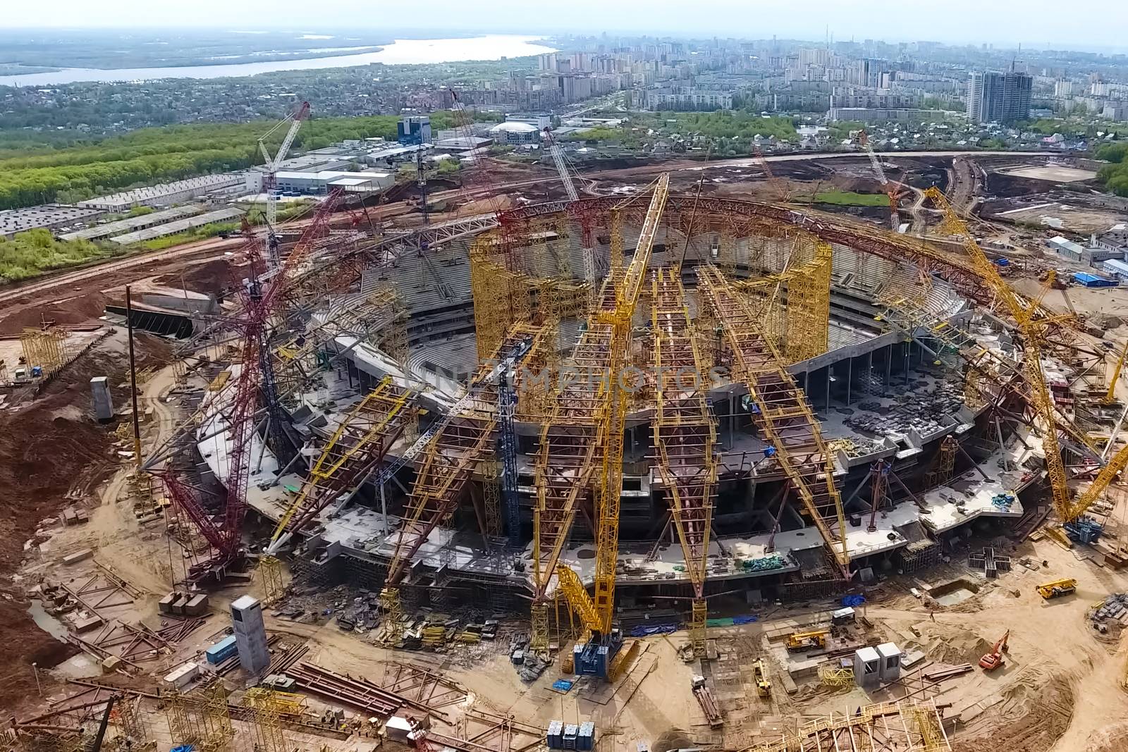 Moscow, Russia - May 12, 2018: Equipment for the construction of the stadium. Tower cranes and construction machinery. Construction of the stadium.