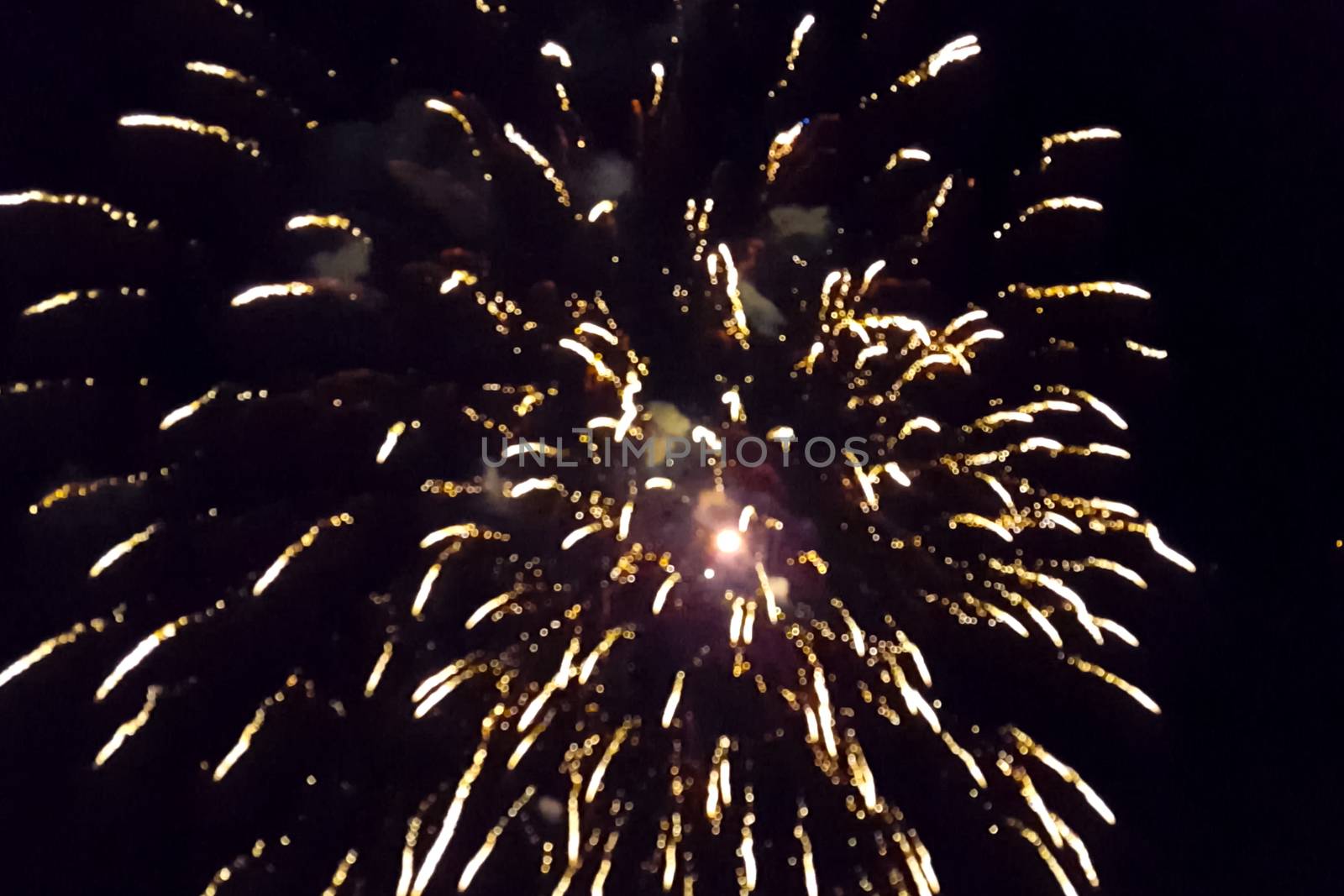 Festive salute in the night sky. Explosions of fireworks.