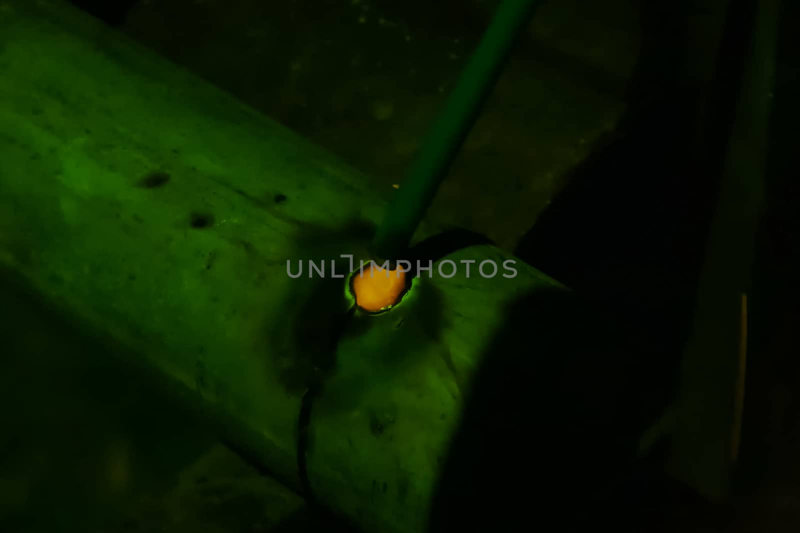 Metal pipe during welding. Sparks and scale.