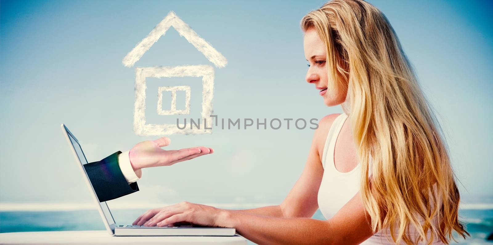 Composite image of pretty blonde using her laptop at the beach with hand presenting cloud house