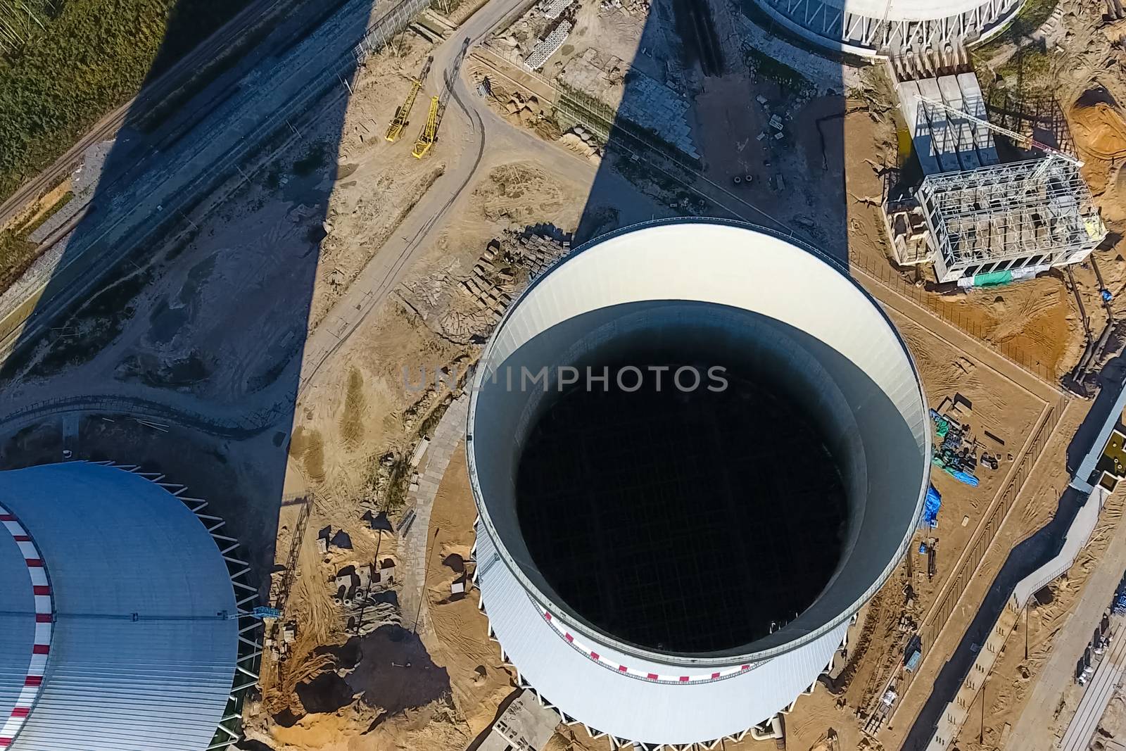 Aerial survey of a nuclear power plant under construction. Installation and construction of a power plant. Nuclear power.