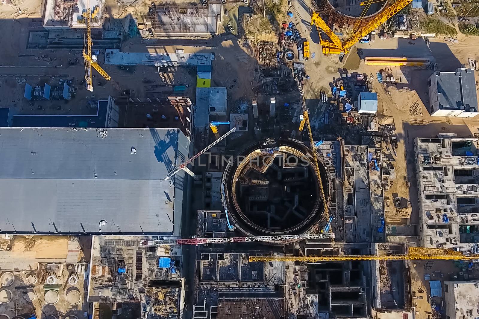 Aerial survey of a nuclear power plant under construction. Installation and construction of a power plant. Nuclear power.