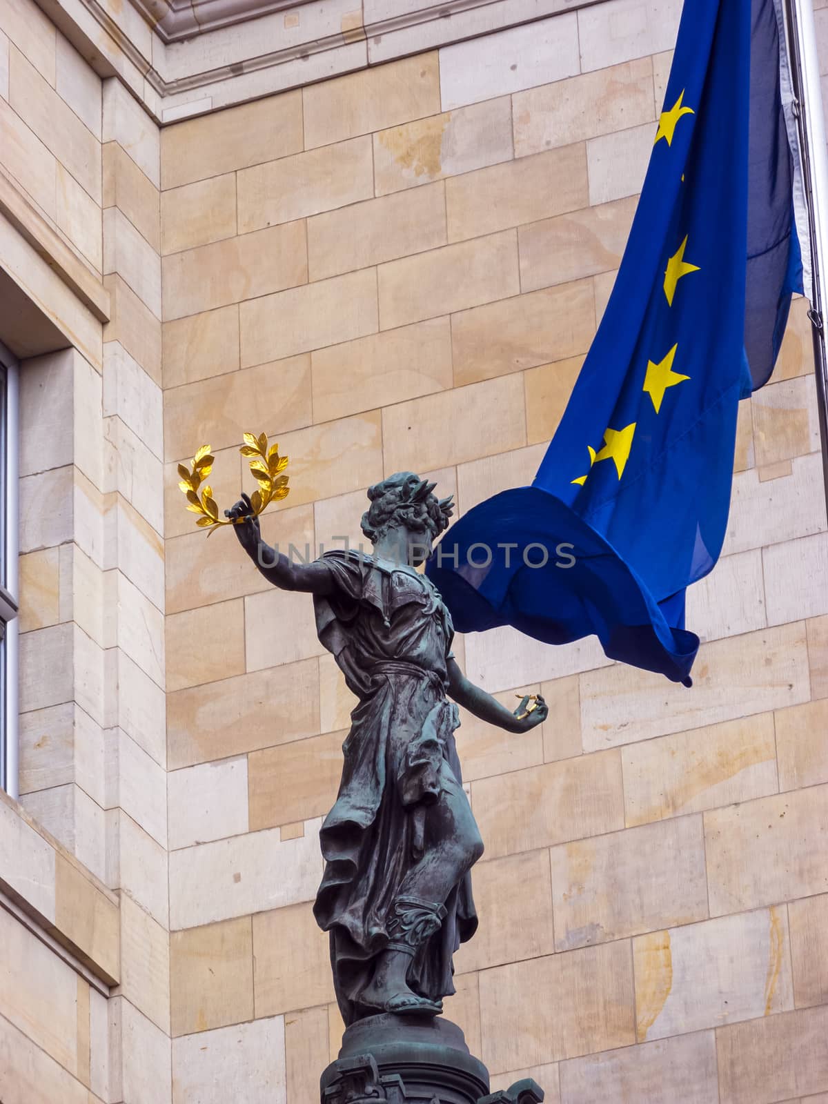 Statue in front of the Reichstag building, the seat of the German parliament by ankarb