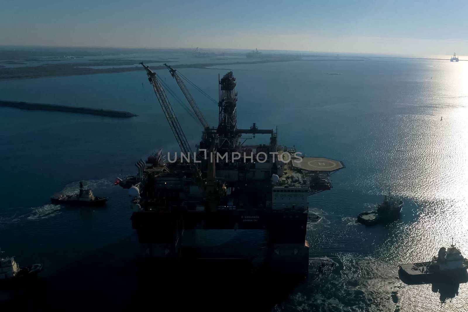 Drilling platform in the port. Towing of the oil platform by nyrok