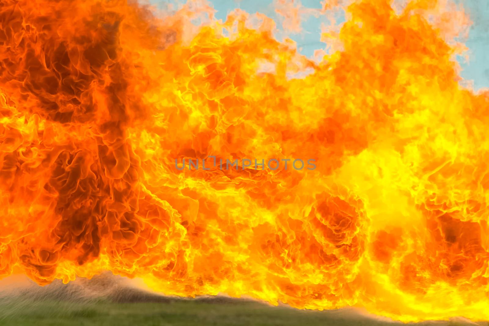 Flame tongues from the flamethrower. background of fire by nyrok