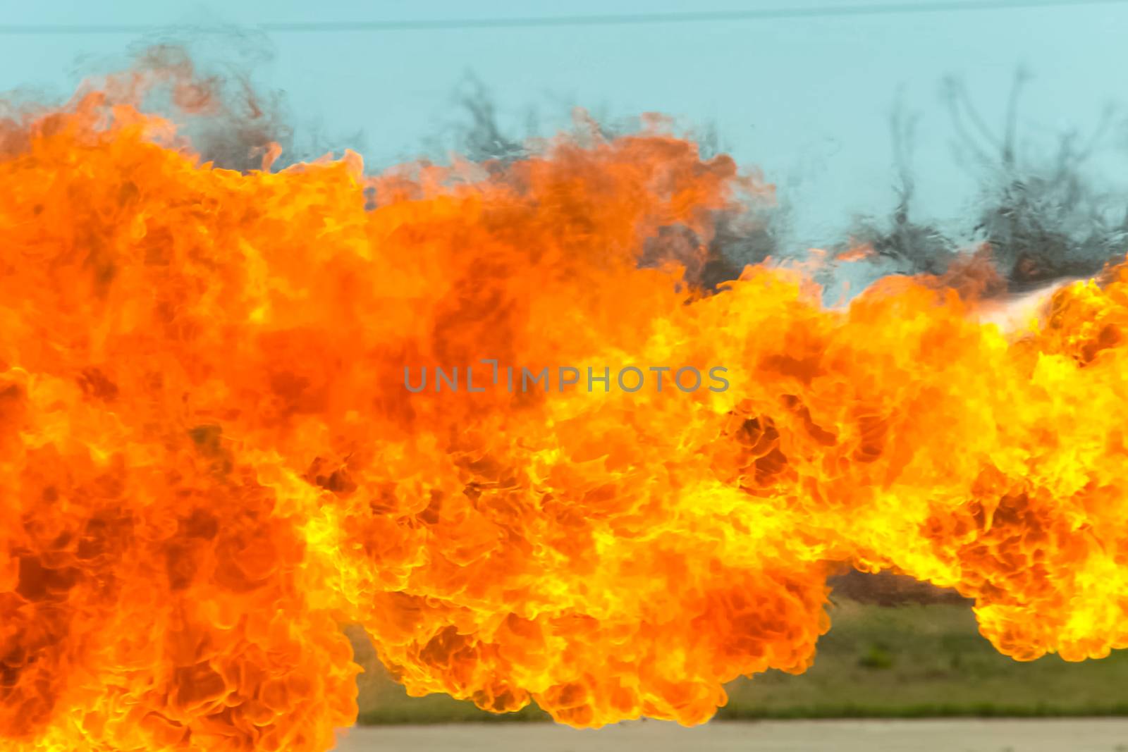 Flame tongues from the flamethrower. background of fire by nyrok