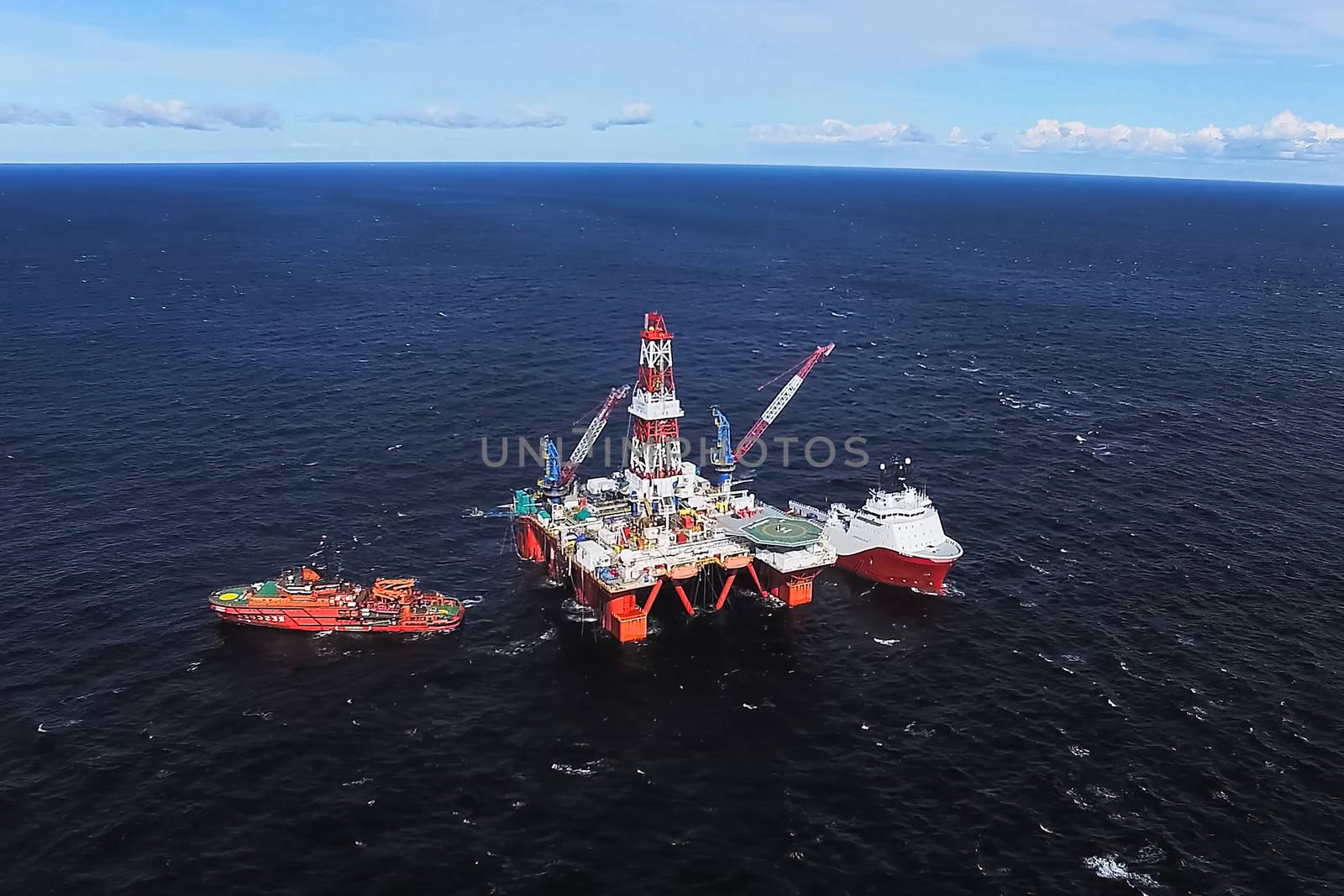 Oil offshore platform in the sea. Extraction of oil on the shelf.