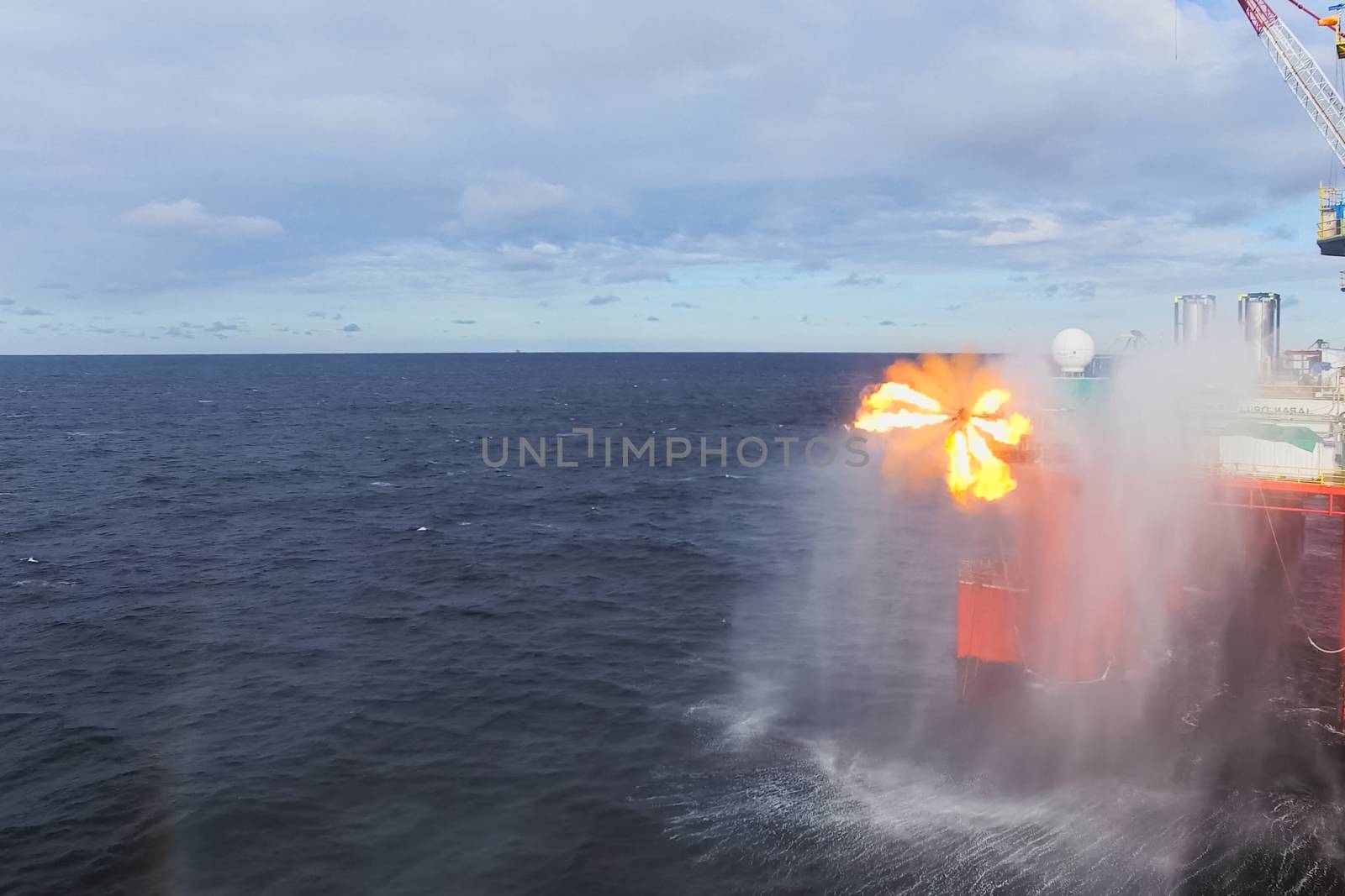 Oil offshore platform in the sea. Extraction of oil on the shelf.