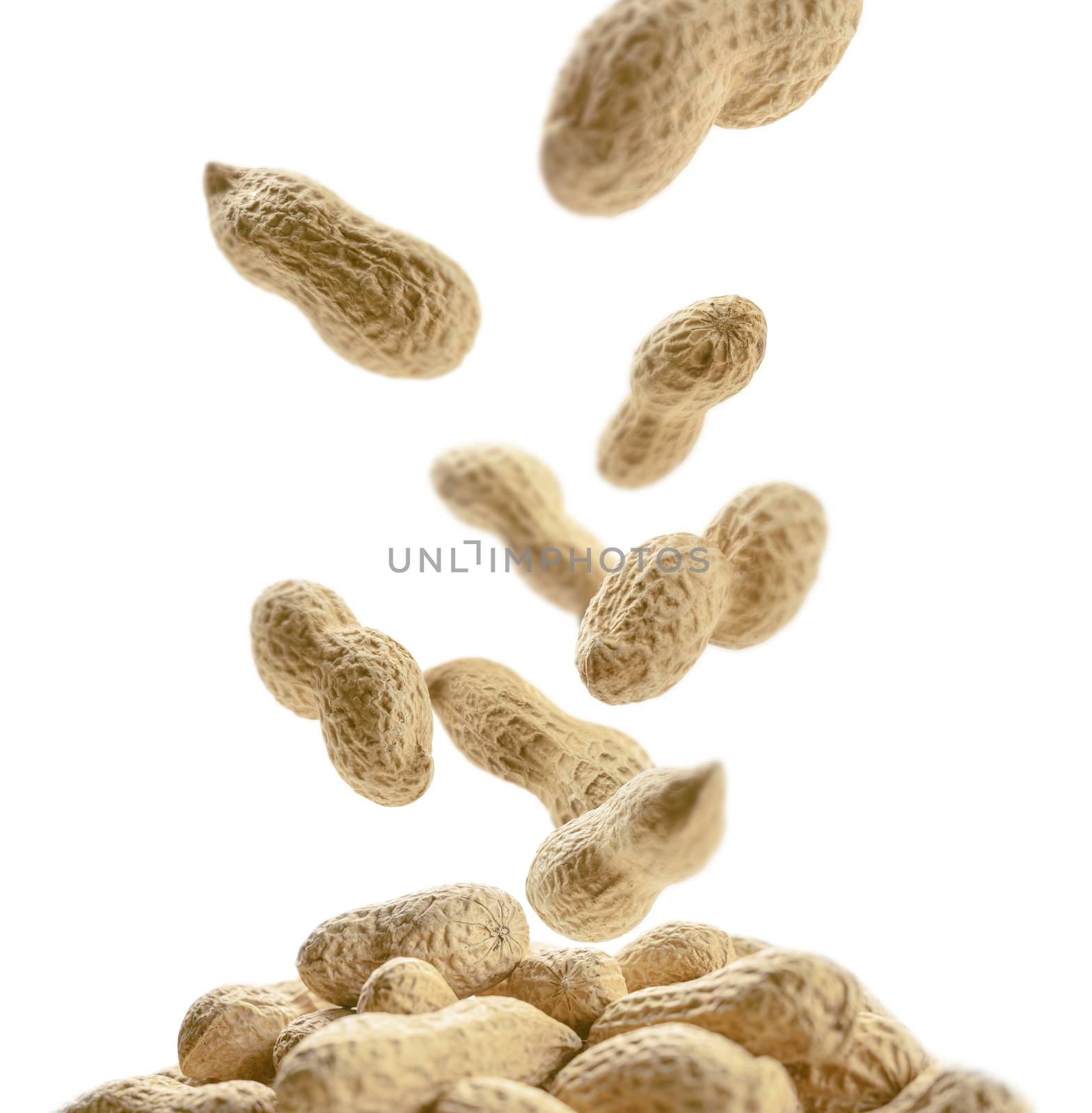 Peanuts in the shell levitate on a white background.