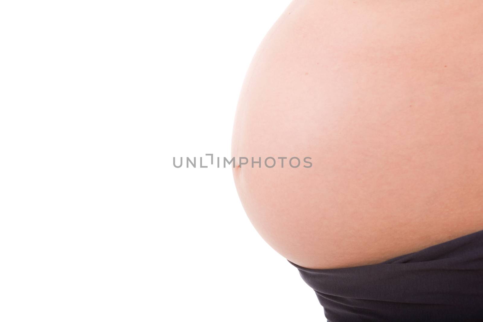 Closeup of pregnant woman at white background