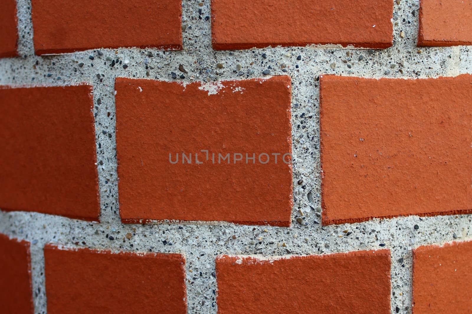 The picture shows a red brick wall