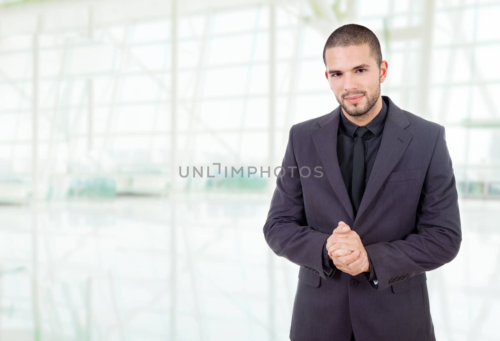 young business man portrait at the office